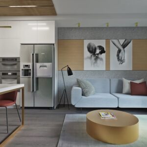 minimalistyczny salon z aneksem kuchennym z lastryko- mieszkanie chojnice